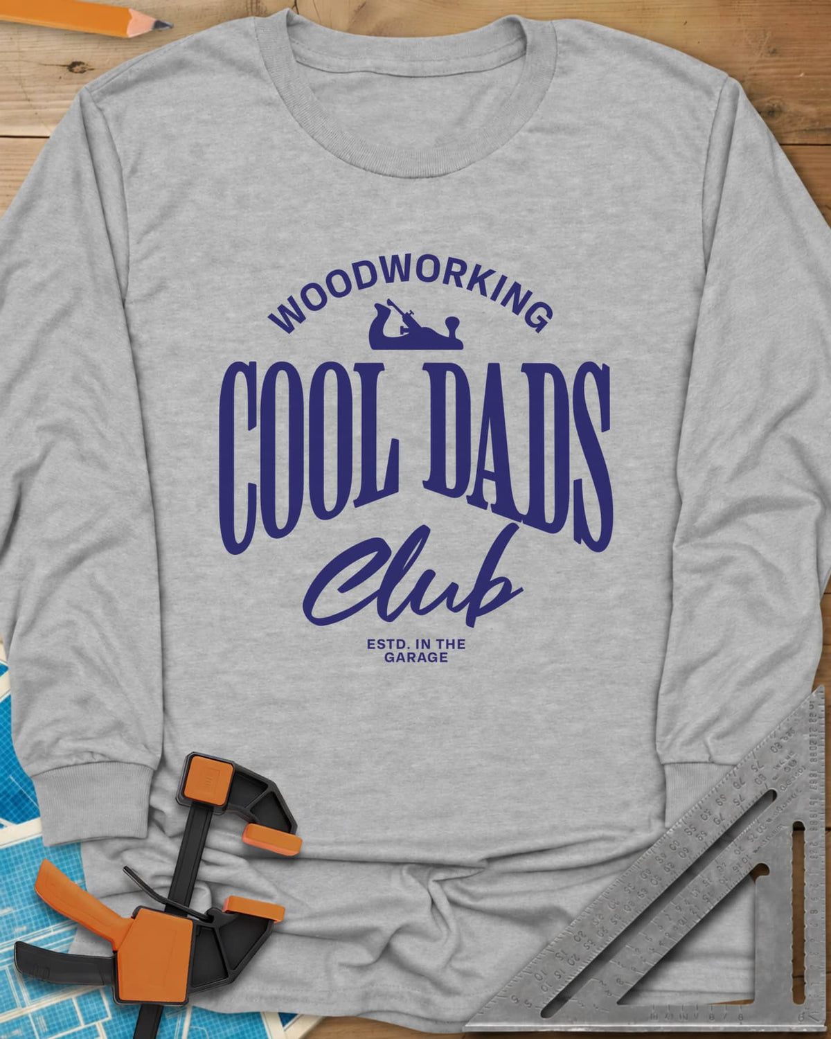 Woodworking Cool Dads long sleeve shirt in Sport Grey, club-style lettering with a small hand plane silhouette