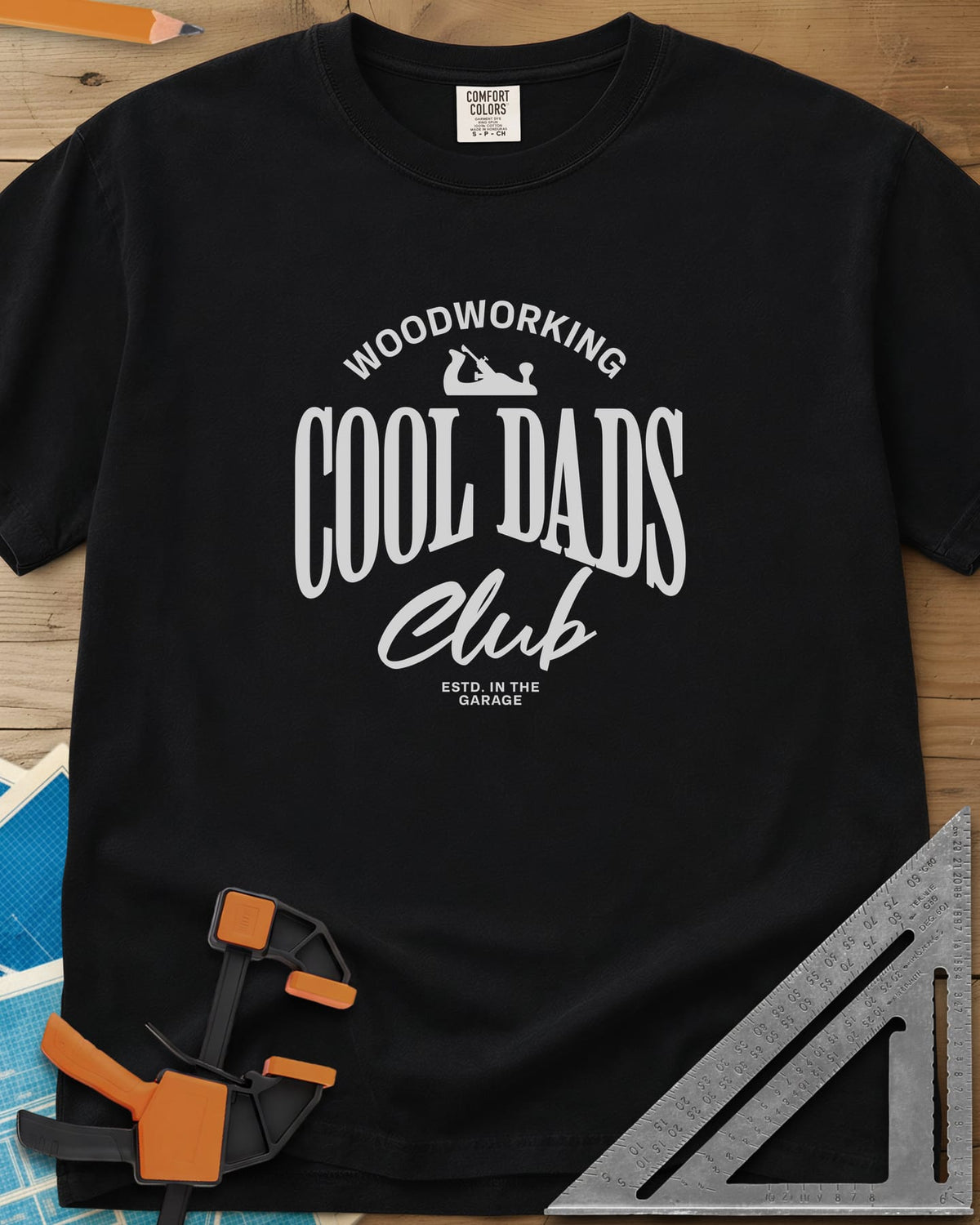 Woodworking Cool Dads heavyweight tee in Black, club-style lettering with a small hand plane silhouette