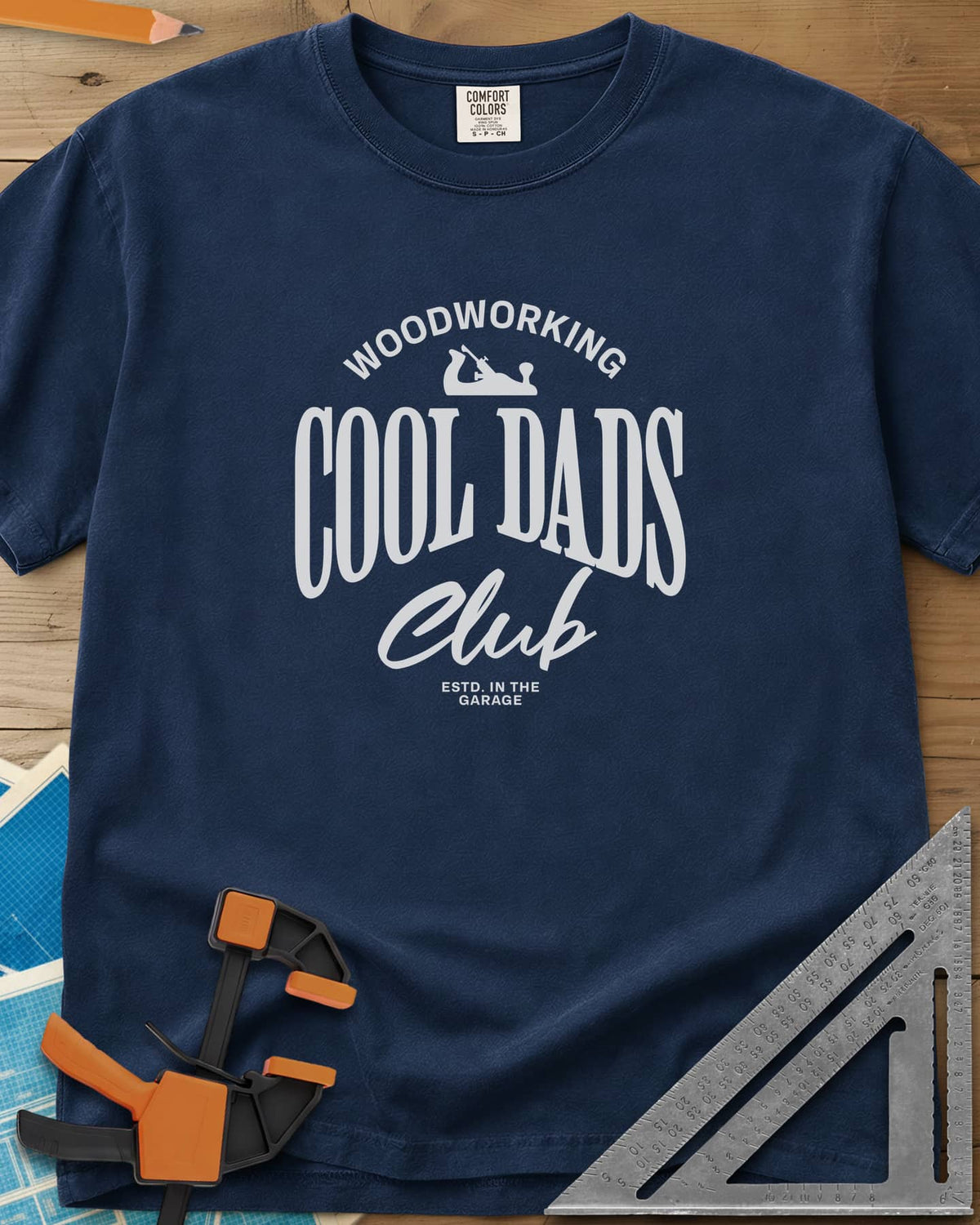 Woodworking Cool Dads heavyweight tee in Navy, club-style lettering with a small hand plane silhouette