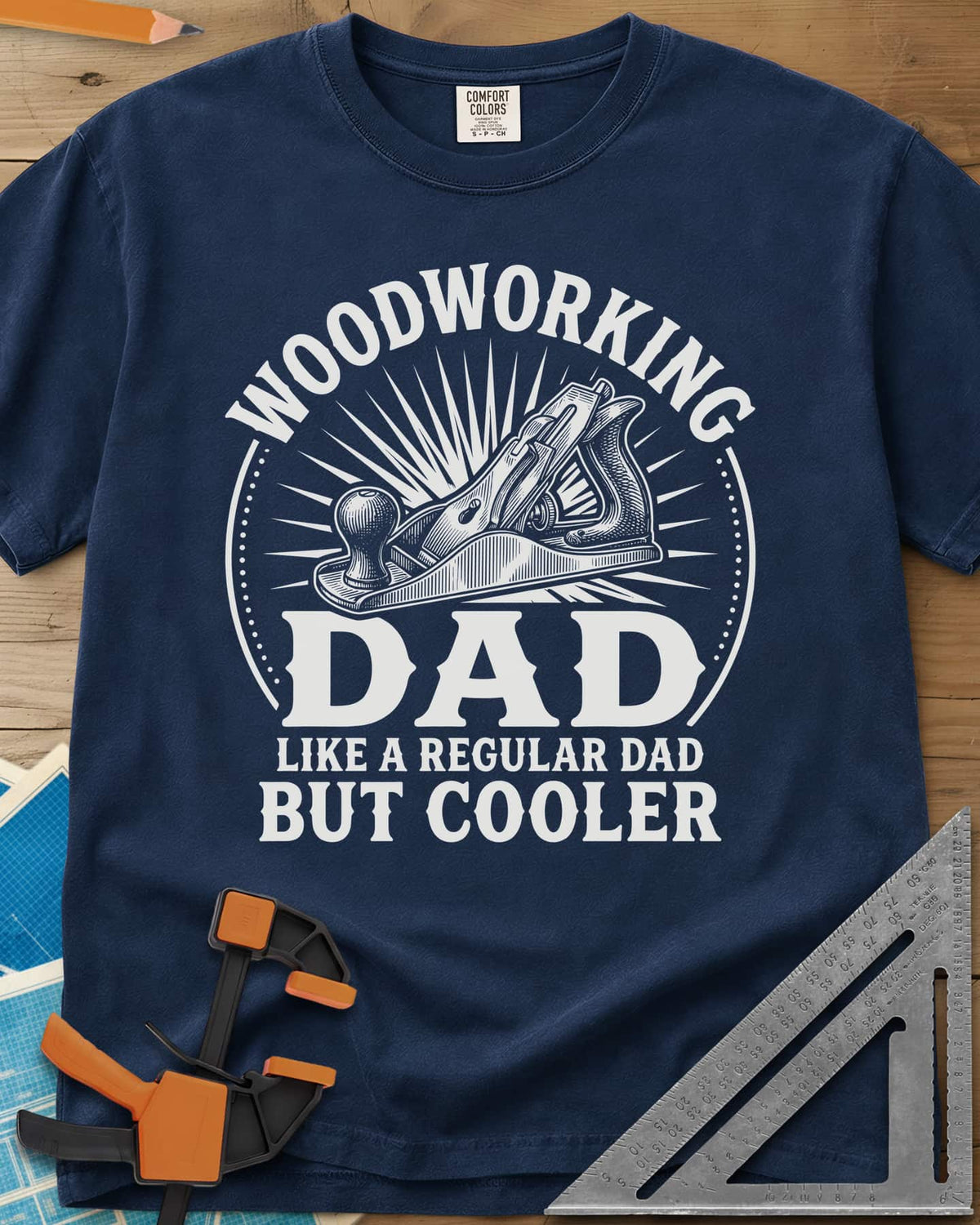 Woodworking Dad But Cooler heavyweight tee in Navy, an engraved hand plane in a sunburst circle