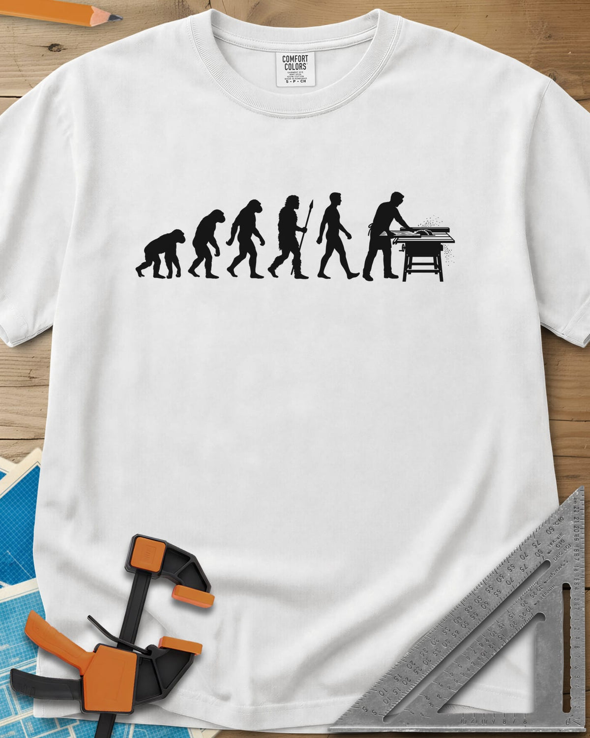 Woodworking Evolution heavyweight tee in White, six white silhouettes from an ape to a man at a table saw