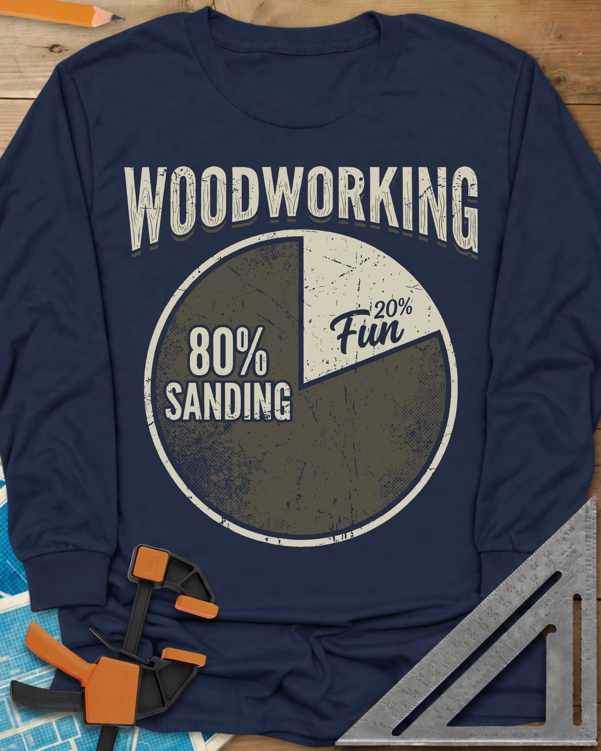 Woodworking Fun long sleeve shirt in Navy, a worn pie chart split 80% sanding and 20% fun