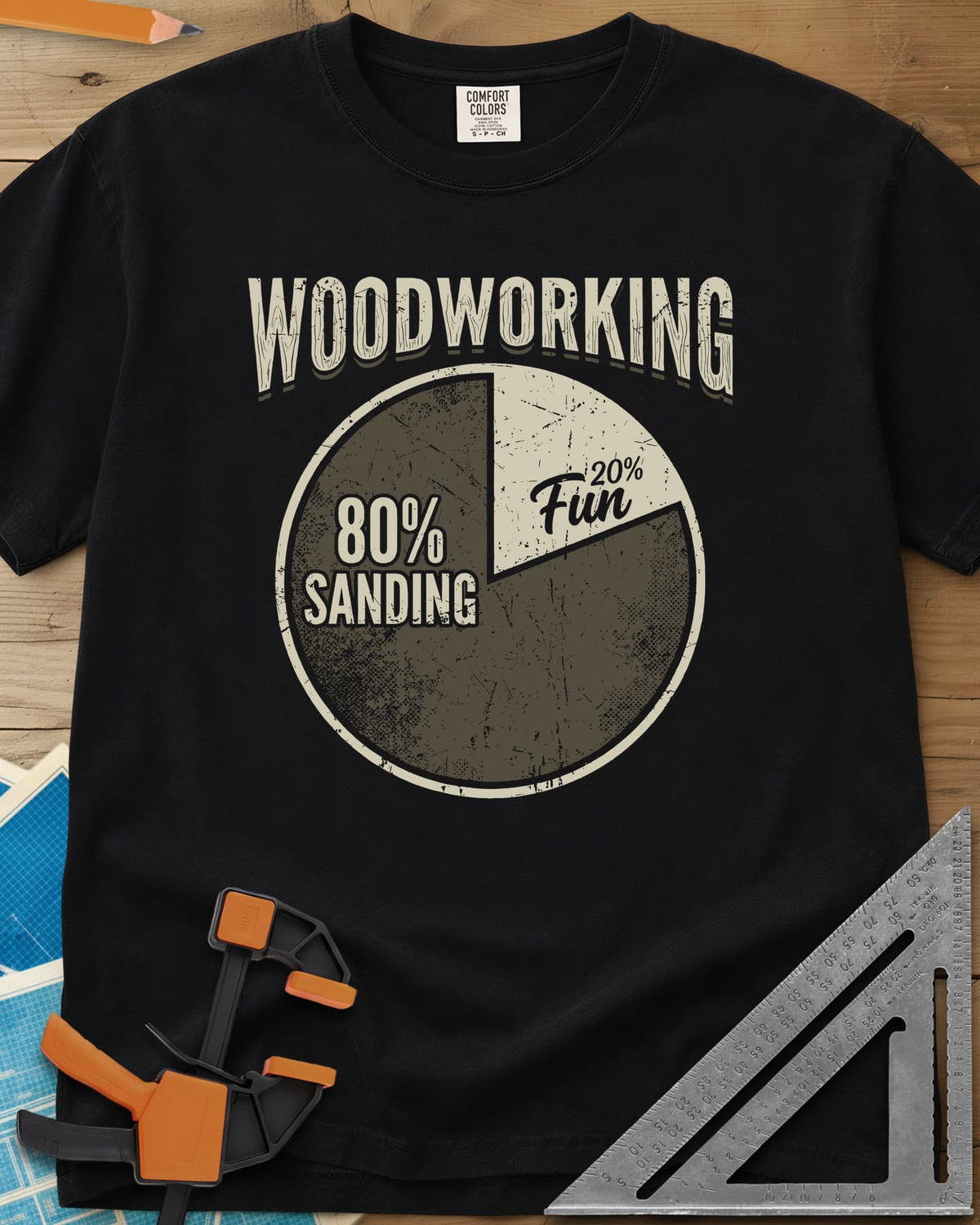 Woodworking Fun heavyweight tee in Black, a worn pie chart split 80% sanding and 20% fun