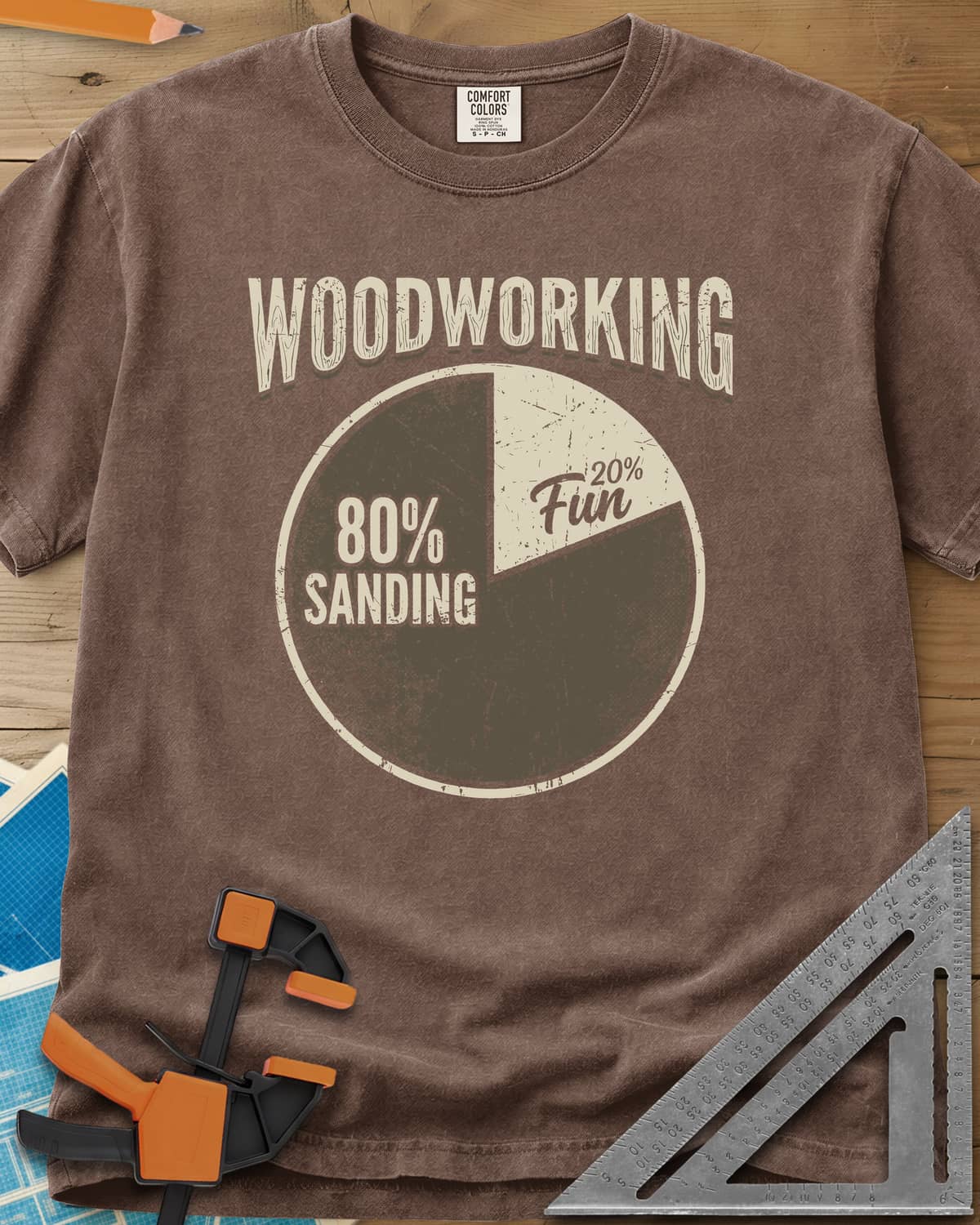 Woodworking Fun heavyweight tee in Espresso, a worn pie chart split 80% sanding and 20% fun