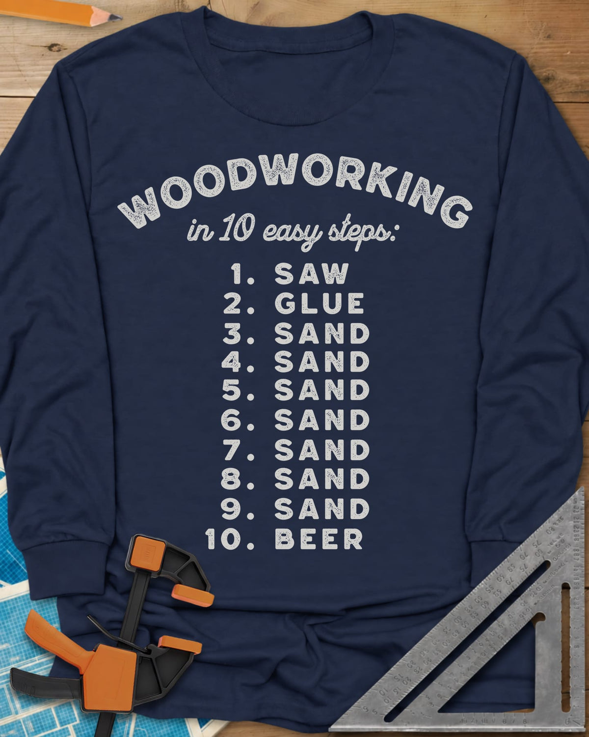 Woodworking in 10 Easy Steps long sleeve shirt in Navy, a numbered list: saw, glue, sand seven times, then beer