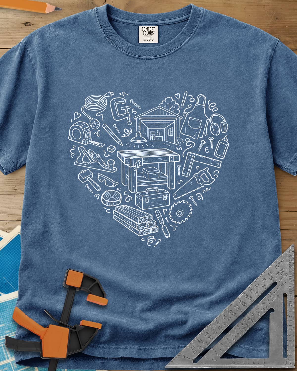 Woodworking Is My Happy Place heavyweight tee in Blue Jean, a heart built from tiny shop tools, a workbench and a garage