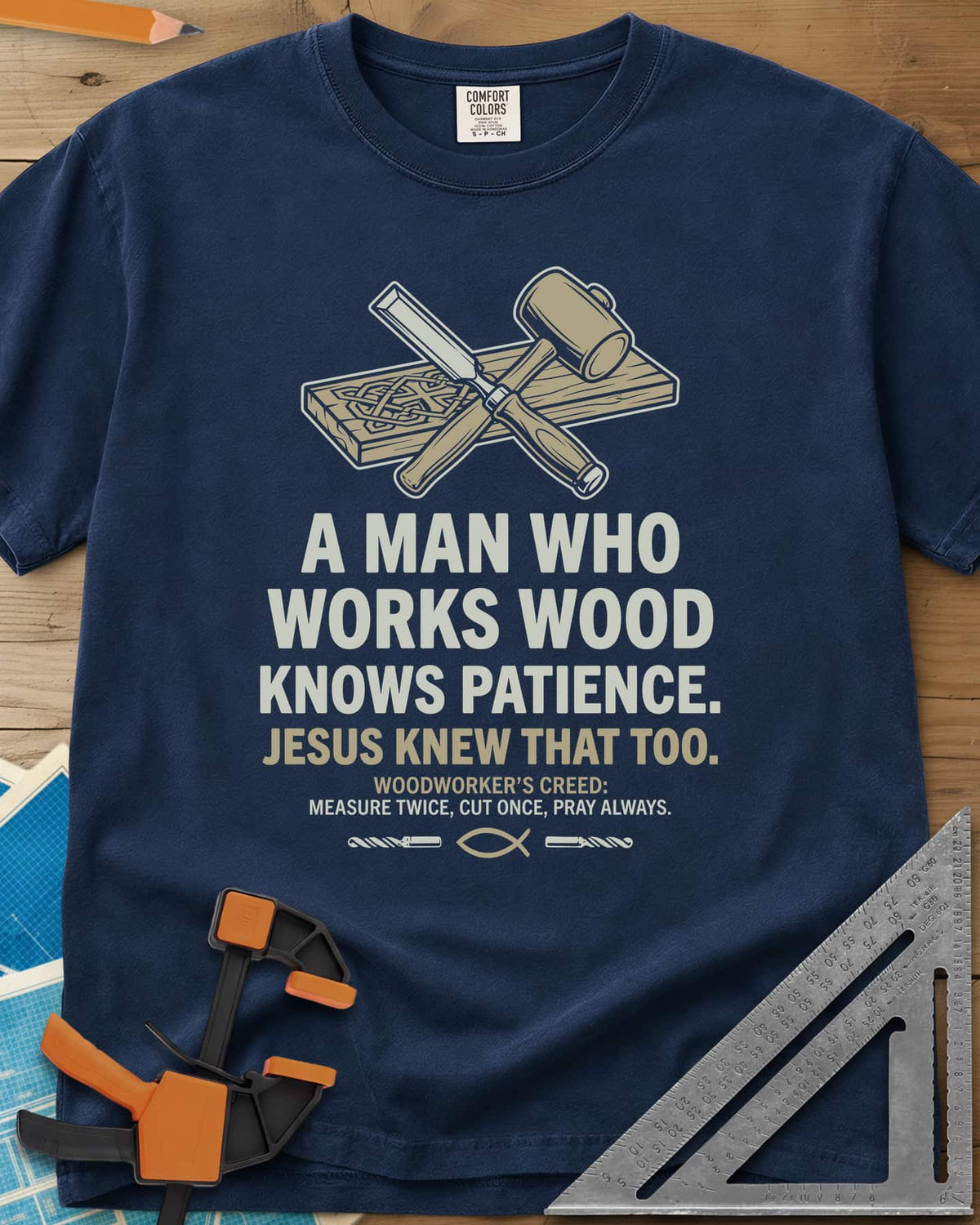 Works Wood Knows Patience heavyweight tee in Navy, a chisel and mallet crossed over a carved board, a small fish symbol