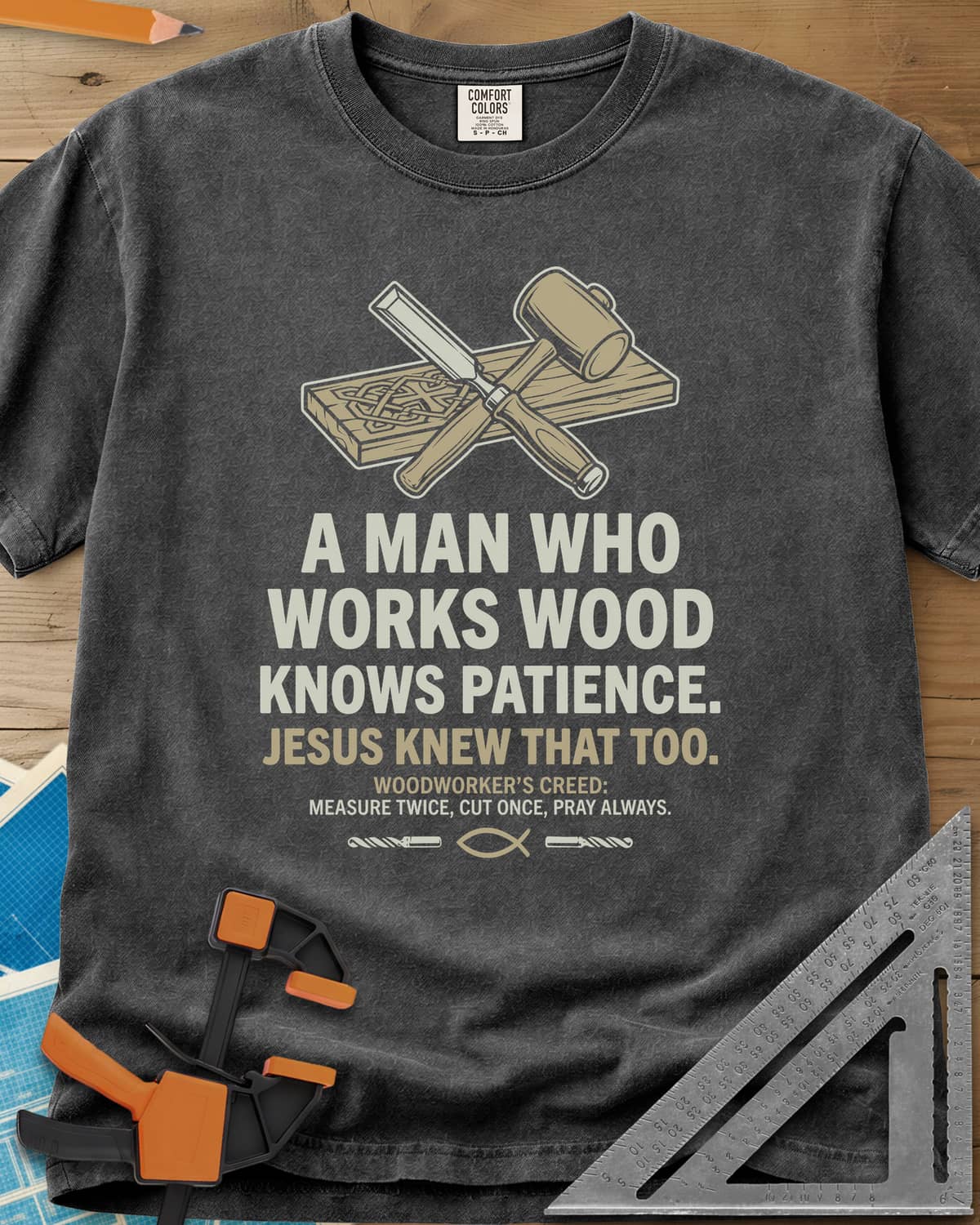 Works Wood Knows Patience heavyweight tee in Pepper, a chisel and mallet crossed over a carved board, a small fish symbol