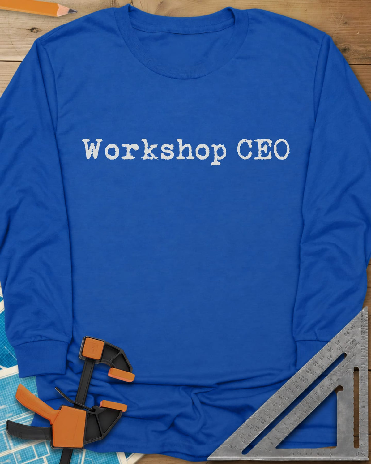 Workshop CEO long sleeve shirt in Royal, small typewriter-style lettering centered on the chest