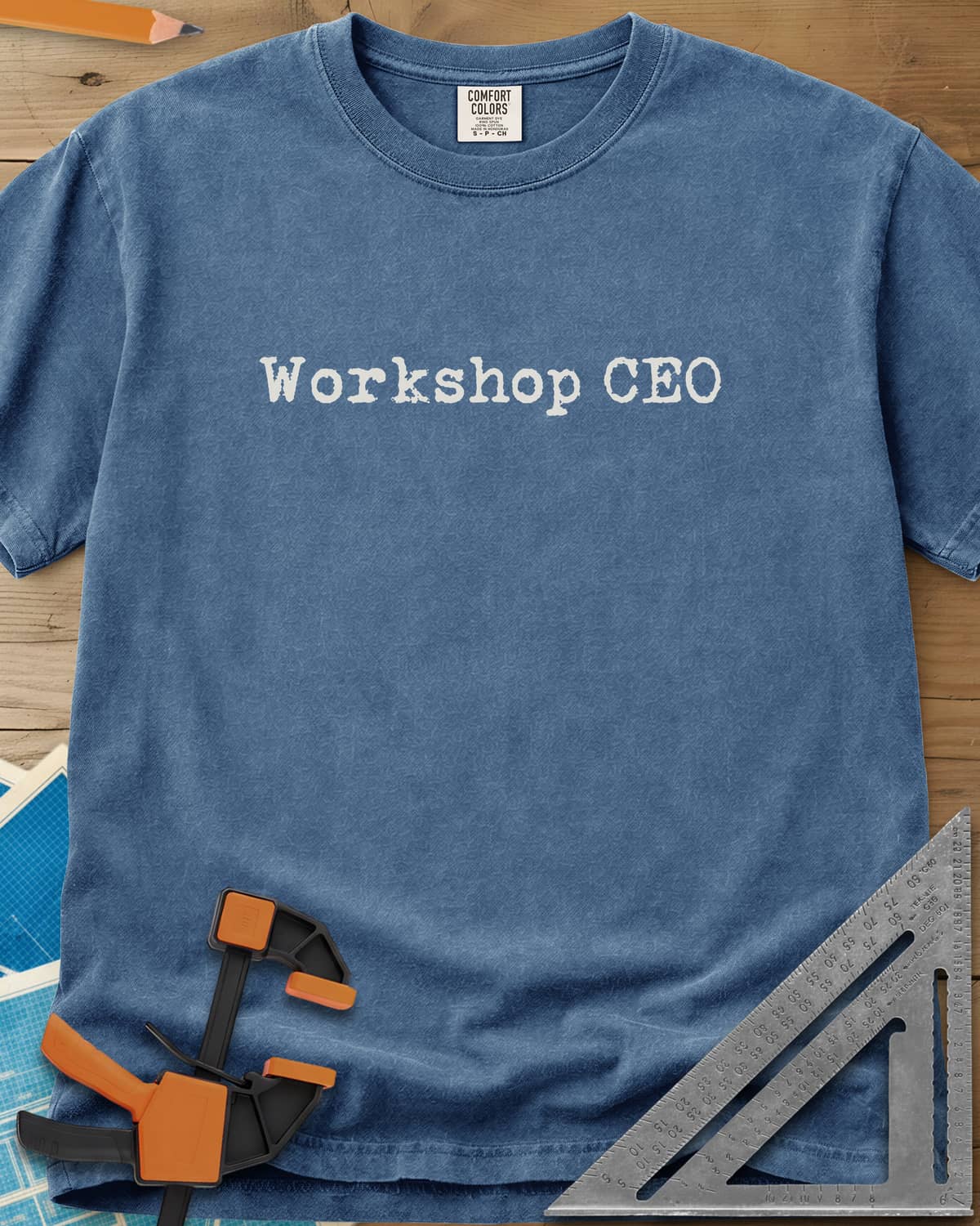 Workshop CEO heavyweight tee in Blue Jean, small typewriter-style lettering centered on the chest