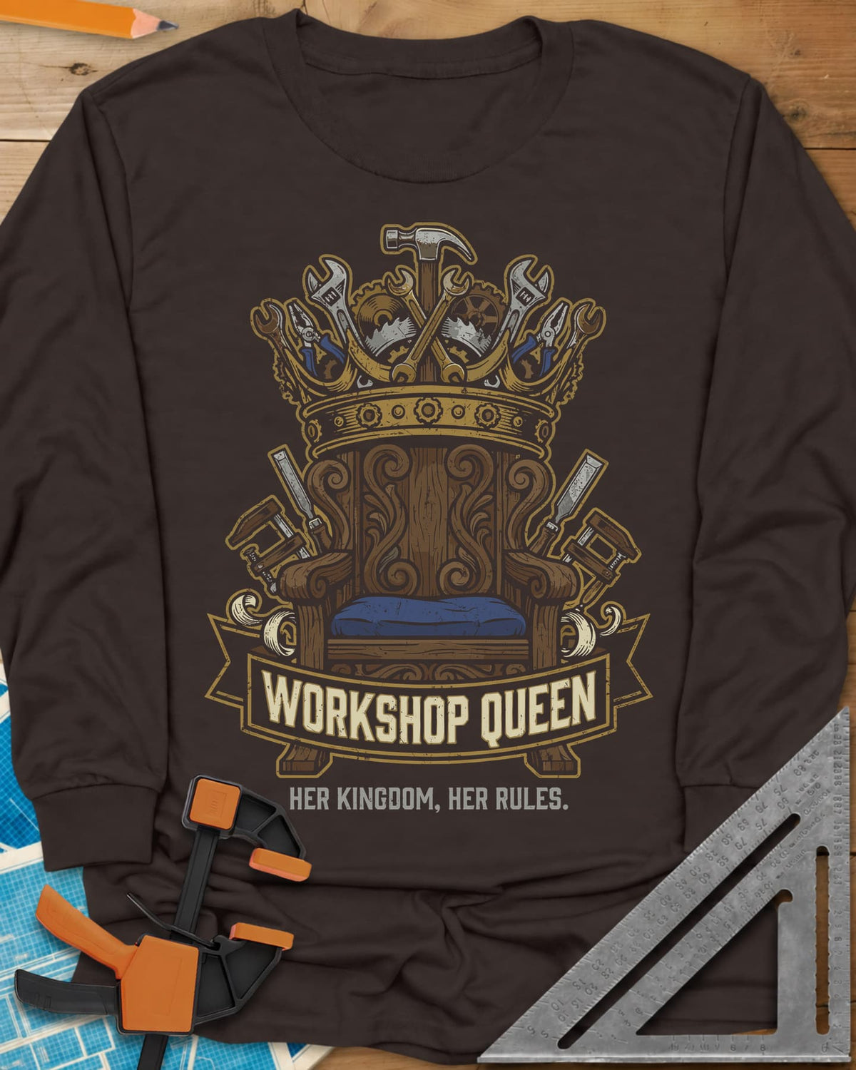 Workshop Queen long sleeve shirt in Dark Chocolate, a carved wooden throne under a crown made of tools