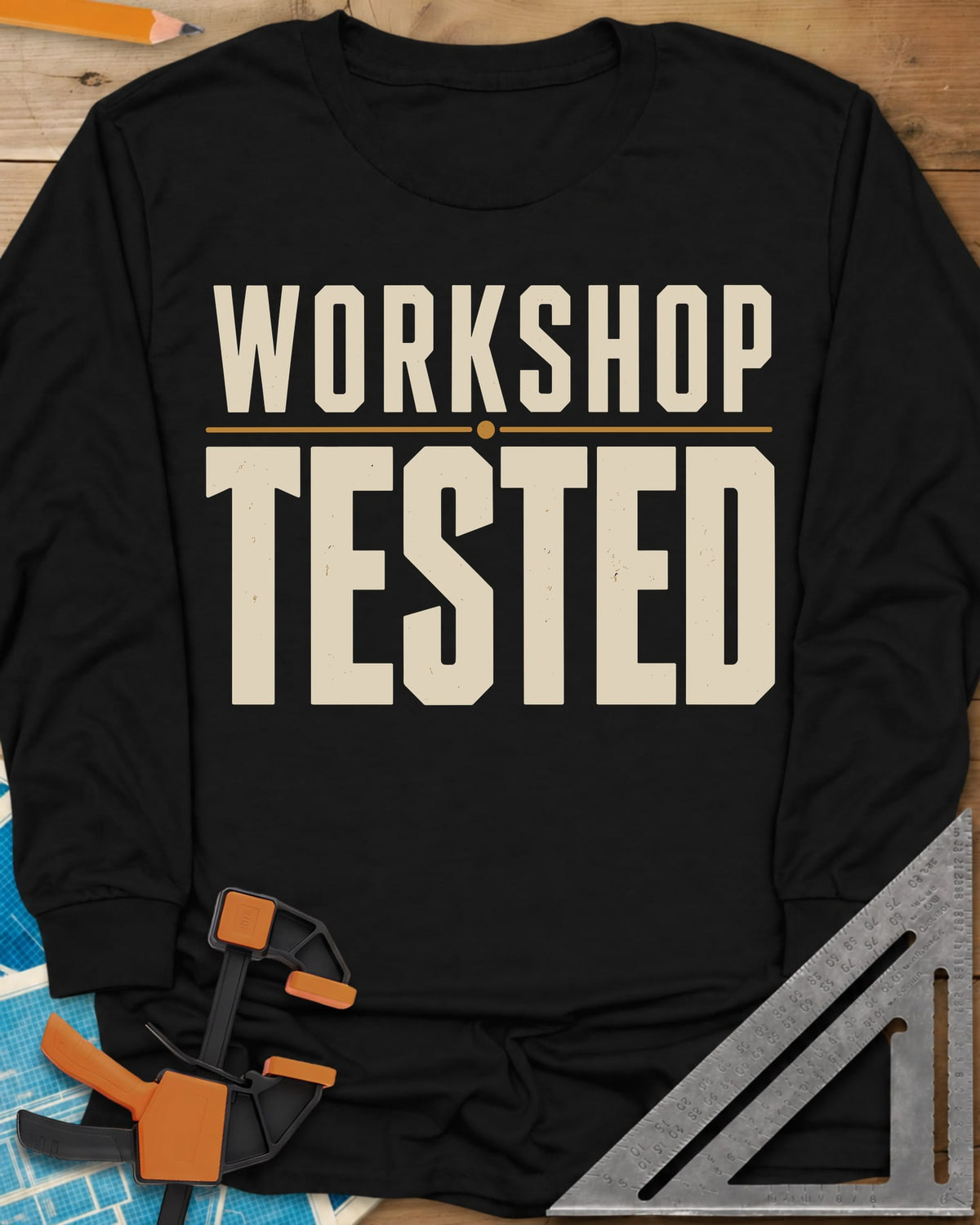 Workshop Tested long sleeve shirt in Black, bold block lettering with a thin gold rule, no graphics