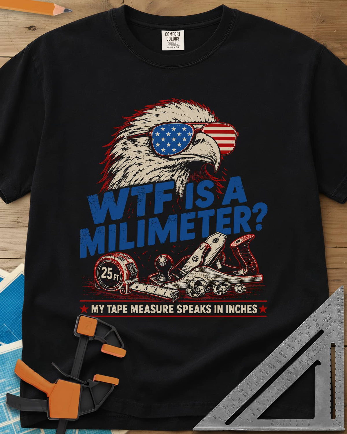 WTF Is A Millimeter heavyweight tee in Black, an eagle in flag sunglasses above a hand plane and 25 ft tape