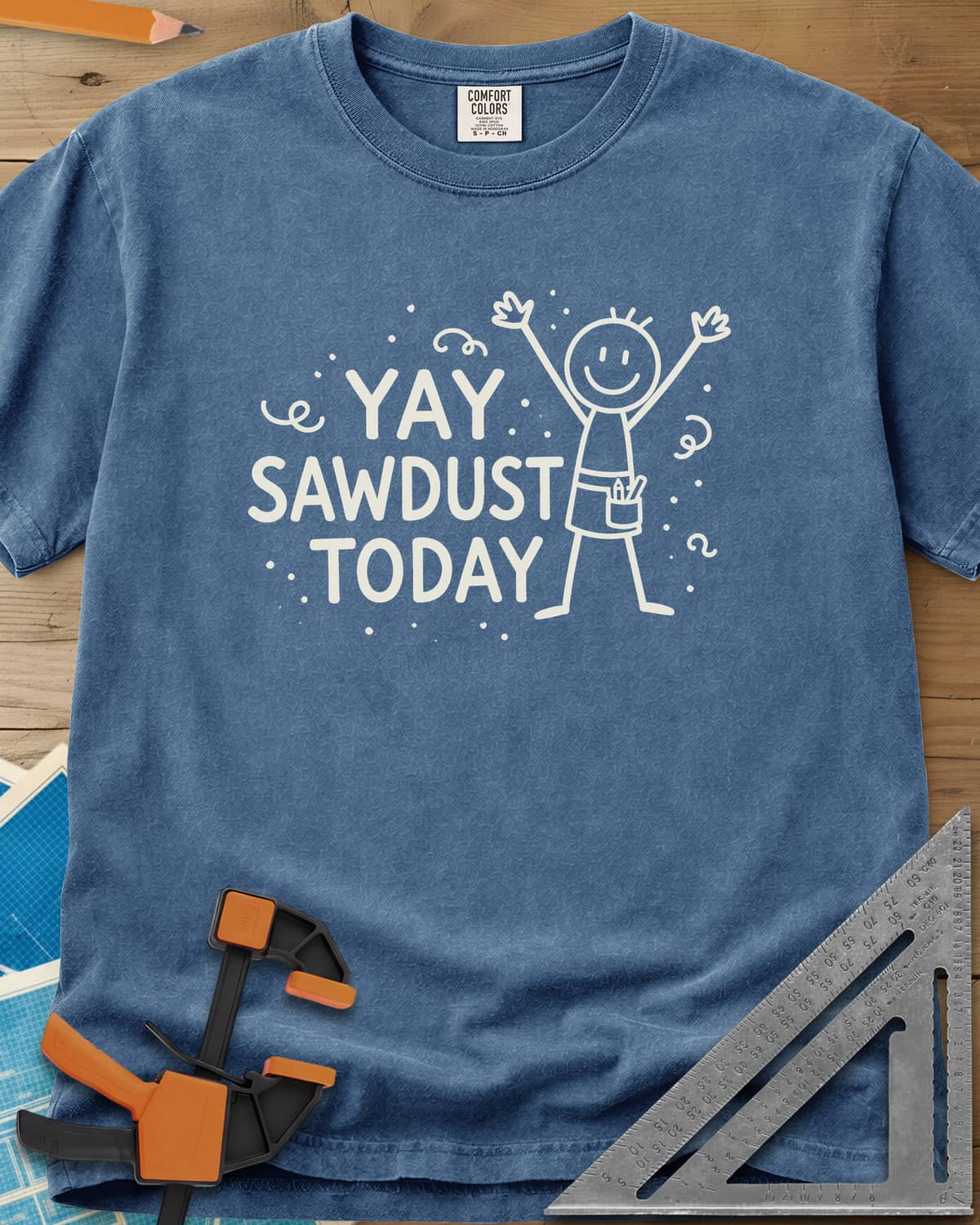 Yay Sawdust Today heavyweight tee in Blue Jean, a cheering stick figure with a pencil-filled tool pouch