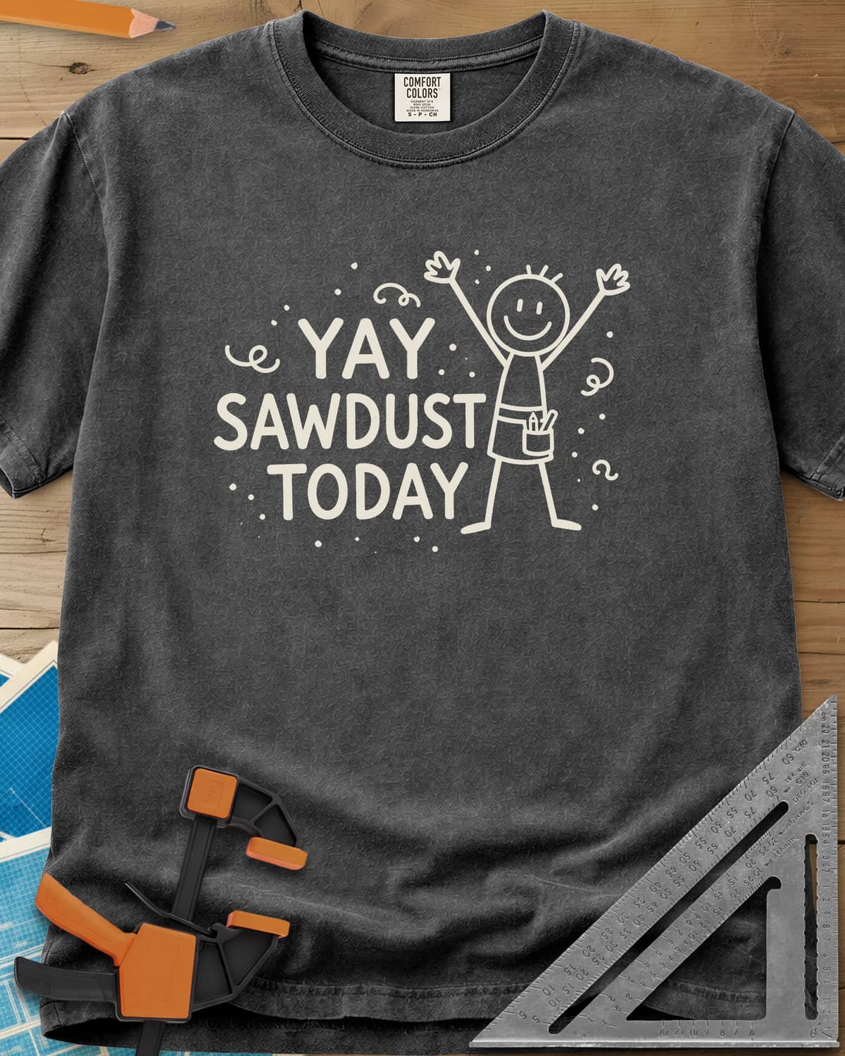 Yay Sawdust Today heavyweight tee in Pepper, a cheering stick figure with a pencil-filled tool pouch