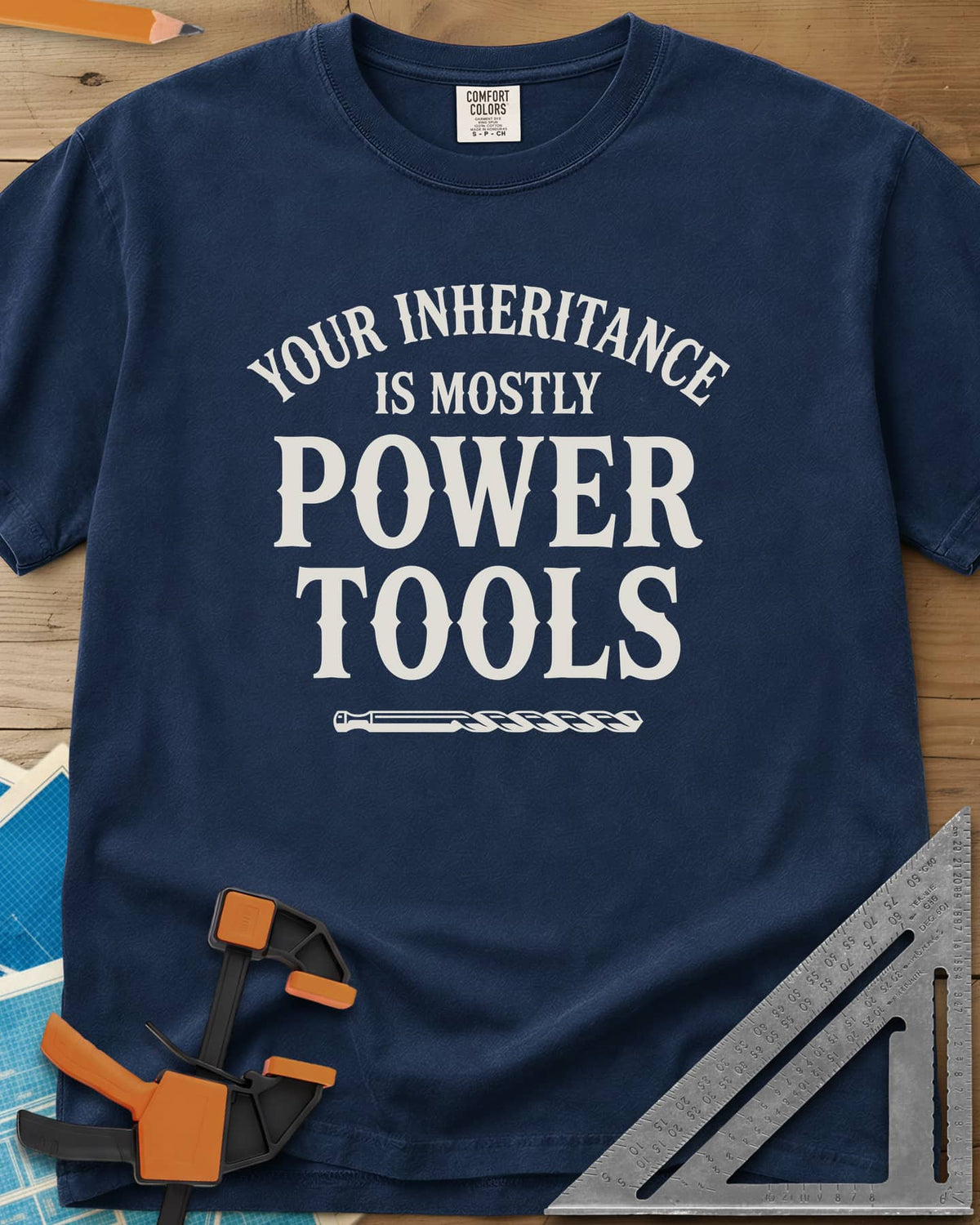 Your Inheritance Is Mostly Power Tools heavyweight tee in Navy, arched serif lettering over a drill bit underline