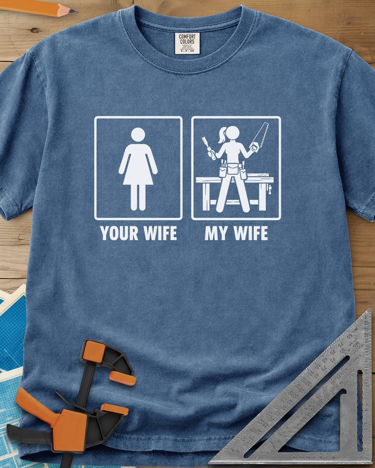 Your Wife My Wife heavyweight tee in Blue Jean, two framed icons, a plain figure and a woman with saw and chisel