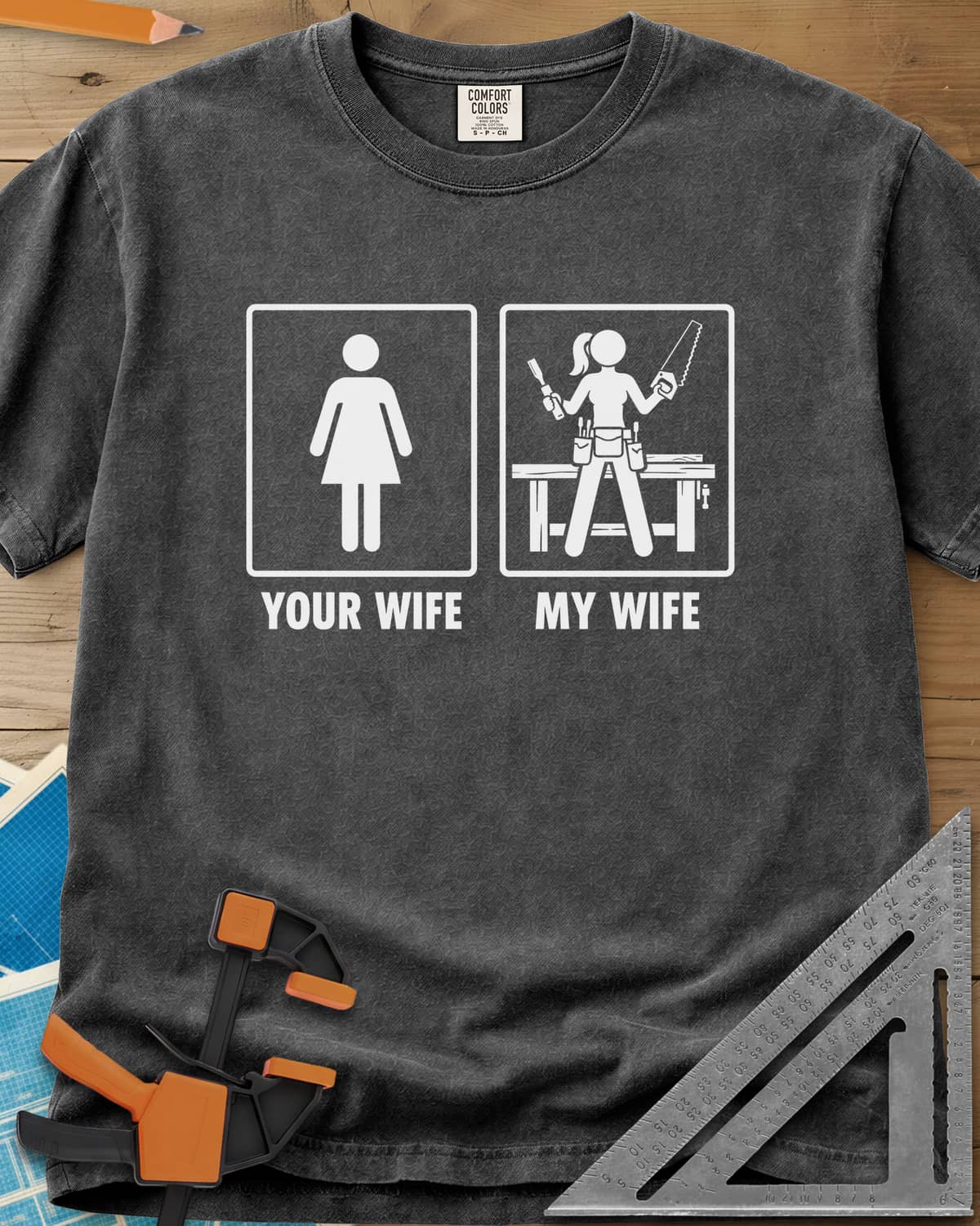 Your Wife My Wife heavyweight tee in Pepper, two framed icons, a plain figure and a woman with saw and chisel