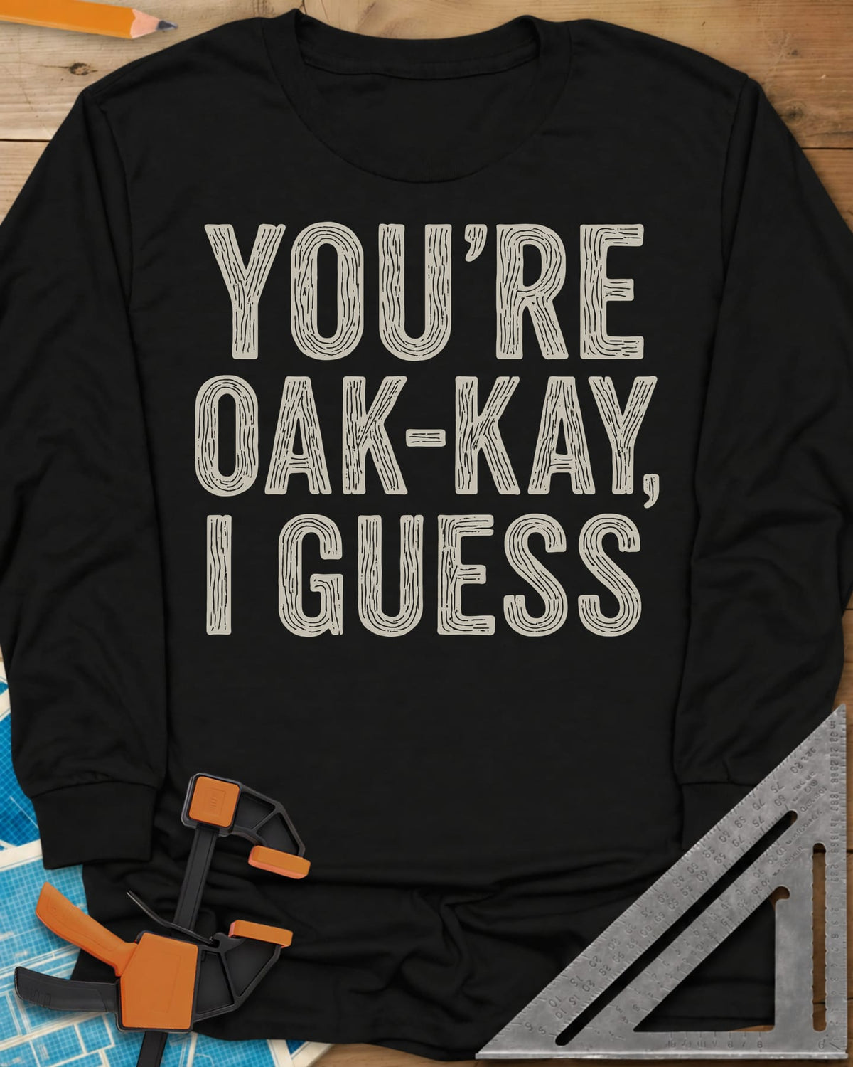 You're Oak-Kay long sleeve shirt in Black, tall block letters filled with wood-grain lines