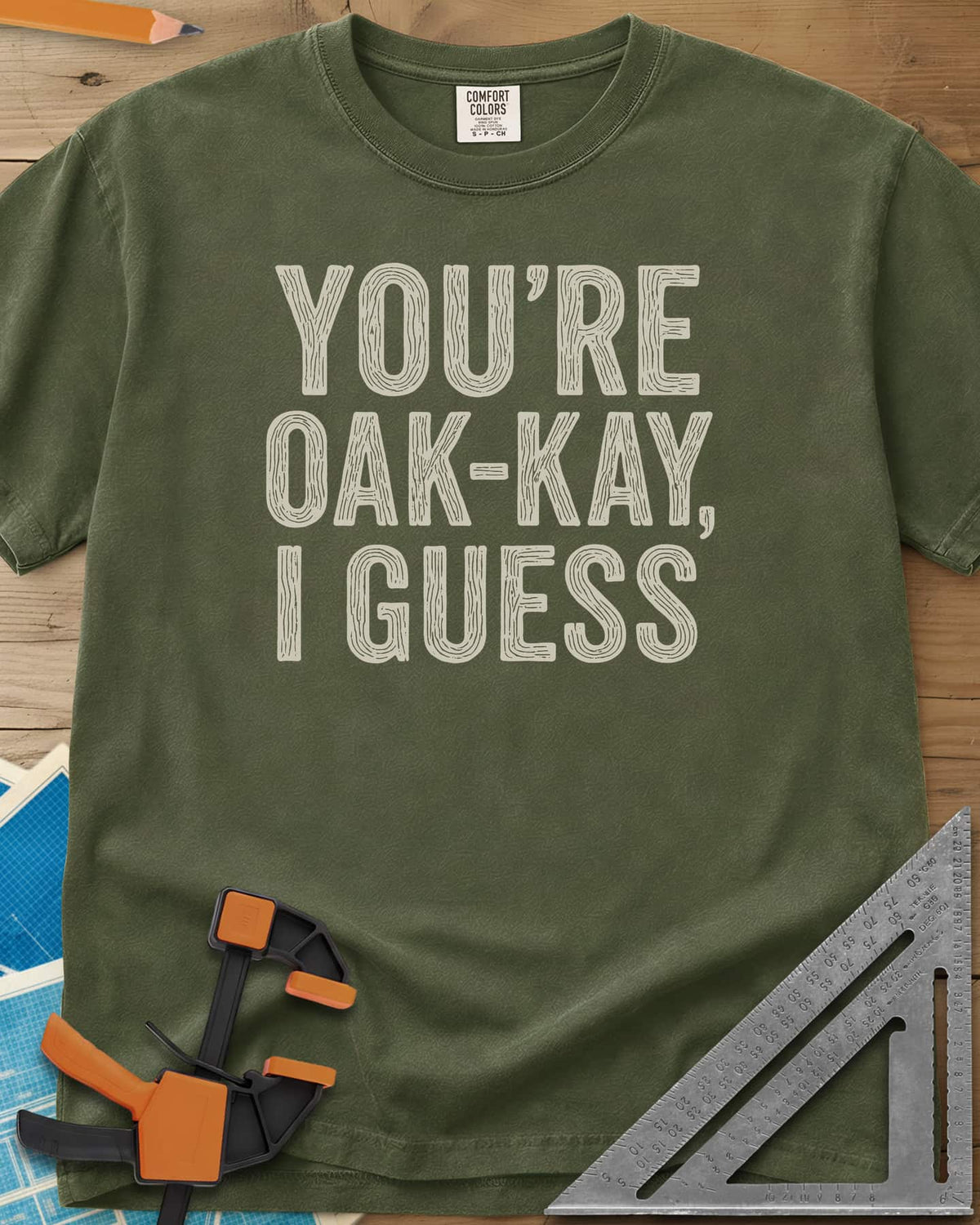 You're Oak-Kay heavyweight tee in Hemp, tall block letters filled with wood-grain lines