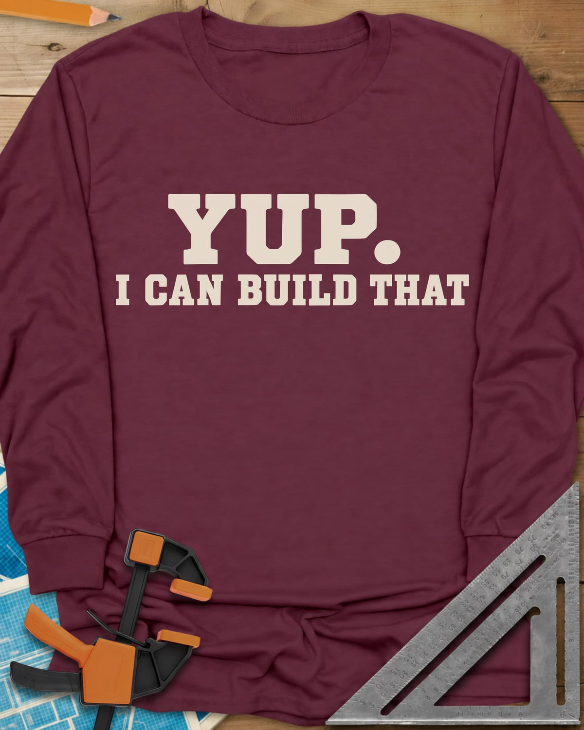 Yup Build That long sleeve shirt in Maroon, bold slab lettering only, with a big round period after YUP