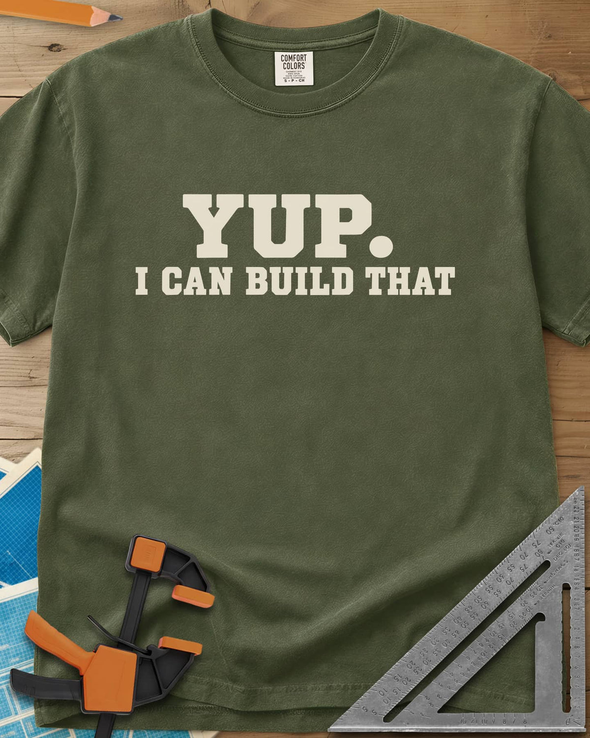 Yup Build That heavyweight tee in Hemp, bold slab lettering only, with a big round period after YUP
