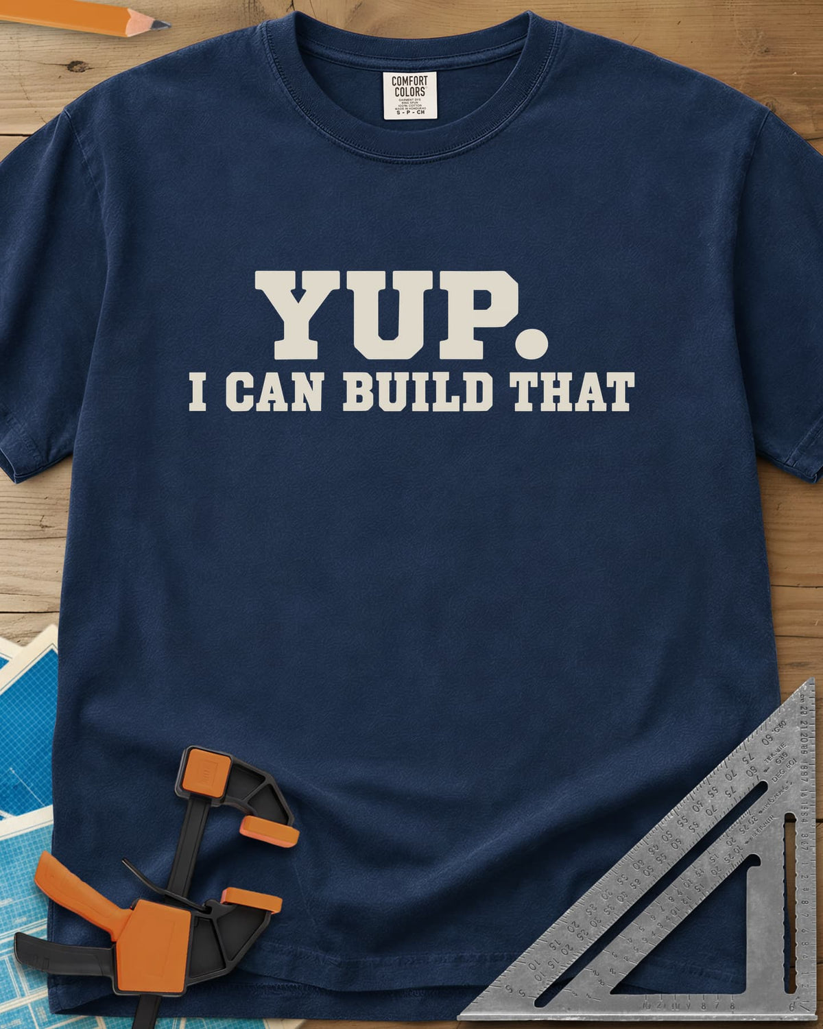 Yup Build That heavyweight tee in Navy, bold slab lettering only, with a big round period after YUP
