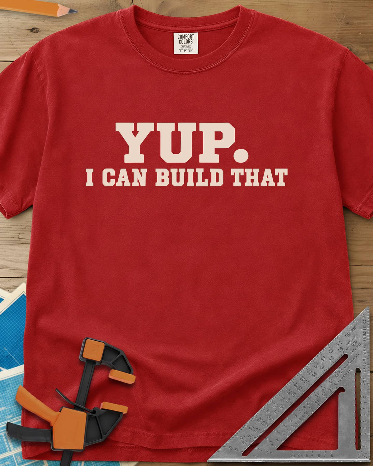Yup Build That heavyweight tee in Red, bold slab lettering only, with a big round period after YUP